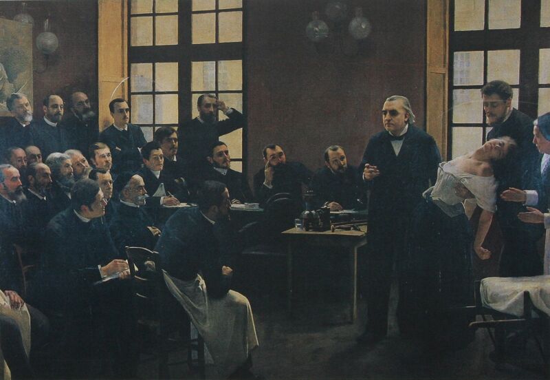 Een dinsdagsessie in La Salpetrière : Jean-Martin Charcot doceert aan de hand van een hysterische vrouw; Albert Londe in het publiek