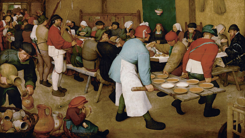 De boerenbruiloft. Let op de in 't zwart geklede figuur met baard uiterst rechts, vaak aanzien als een zelfportret van Bruegel