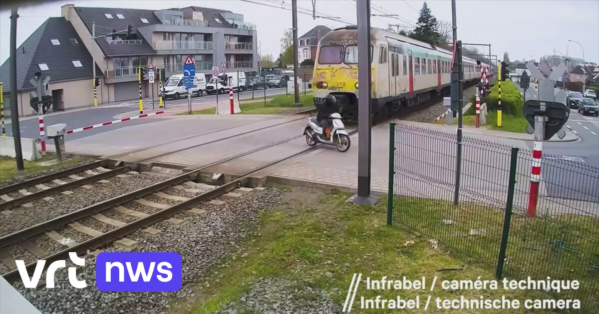 Mind-blowing images show train miss moped by inches (VIDEO)