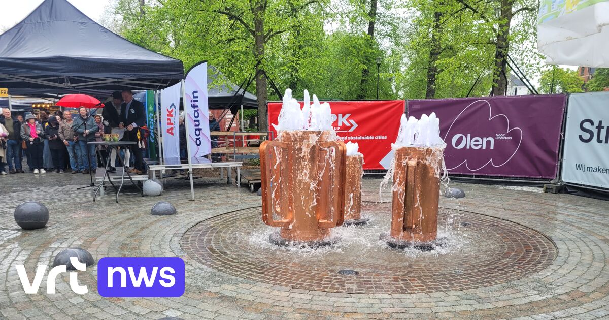 Olen celebrates renewed center with unveiling of restored pot fountain