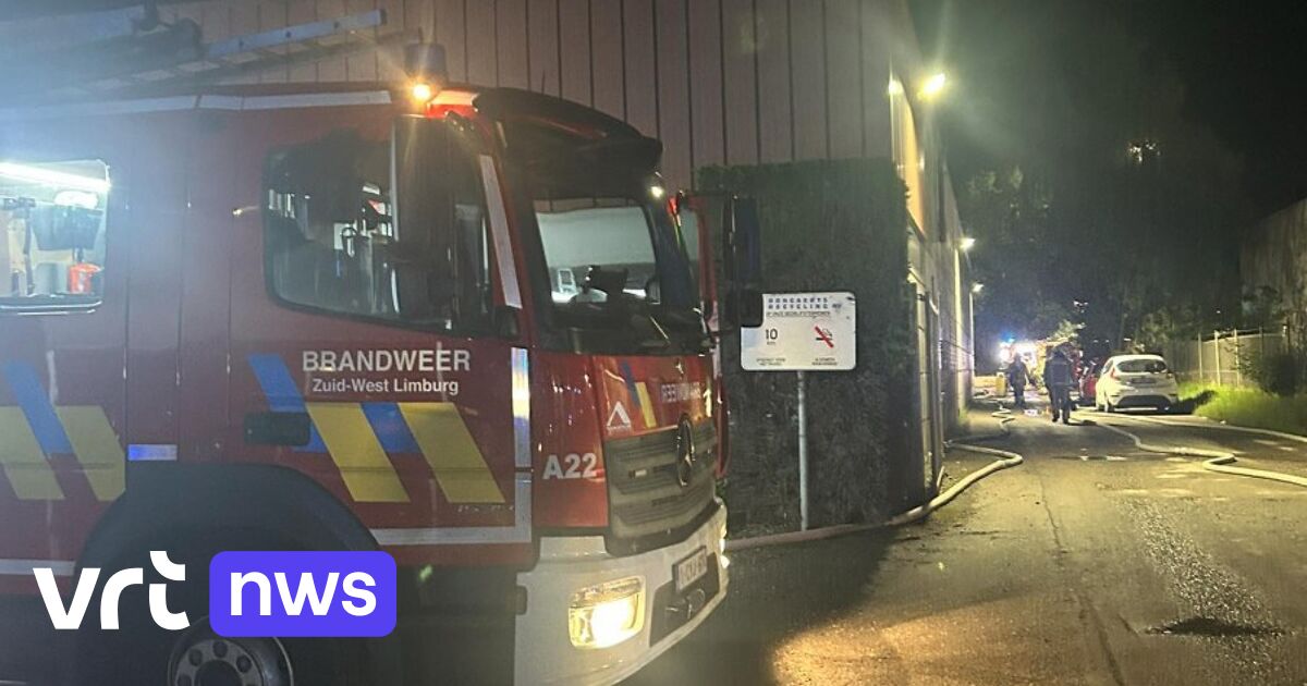 Firefighters respond to a paper-recycling fire at Bongaerts Recycling in Houthalen-Helchteren.