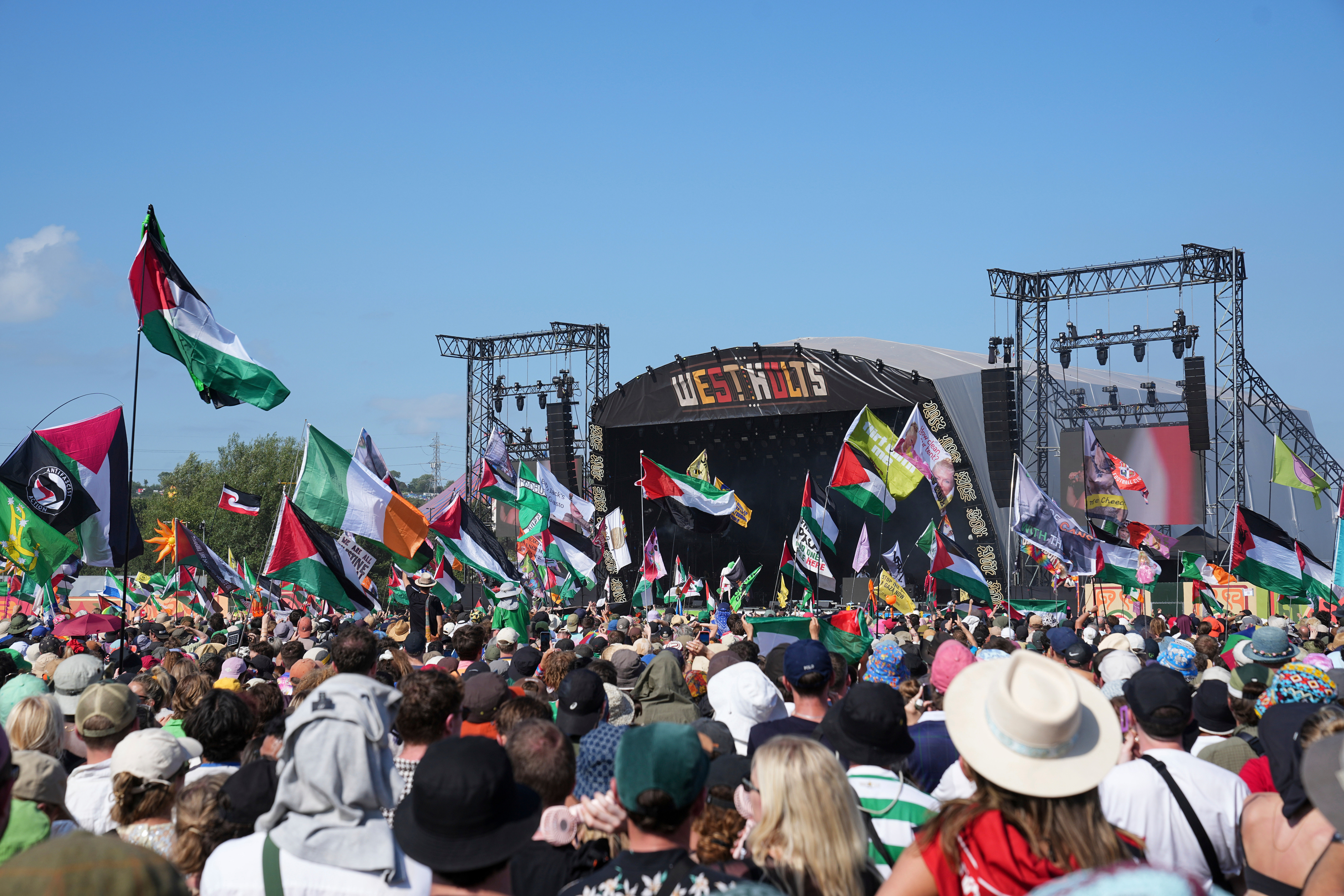 Crowds wave Palestinian flags during hip-hop trio Kneecap’s set at the Glastonbury festival in Worthy Farm. (AP pic)