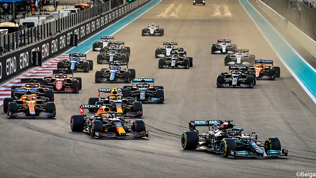 Lewis Hamilton immediately passes Max Verstappen. Formula 1 cars