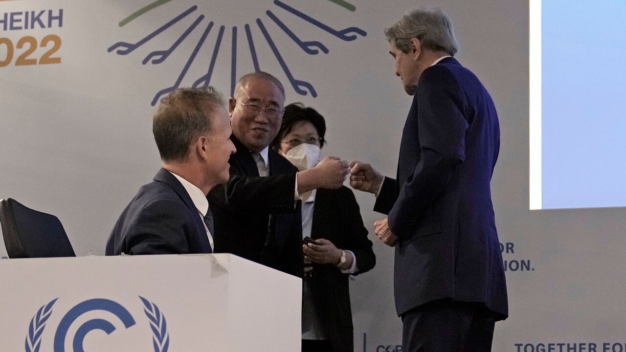 Climate envoys Xie Zhenhua and John Kerry shake hands at the 2022 Climate Summit in Egypt Climate envoys Xie Zhenhua and John Kerry shake hands at the 2022 Climate Summit in Egypt