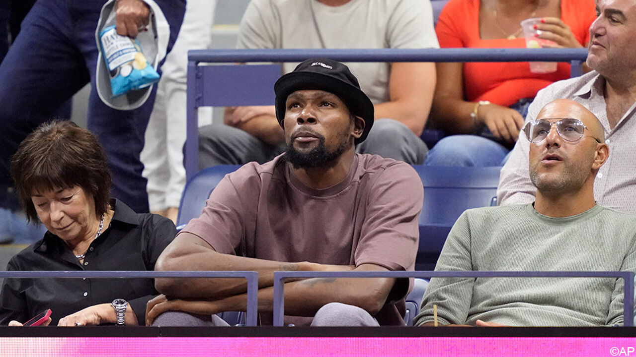 Basketball star Kevin Durant watches the game from the stands. Kevin Durant