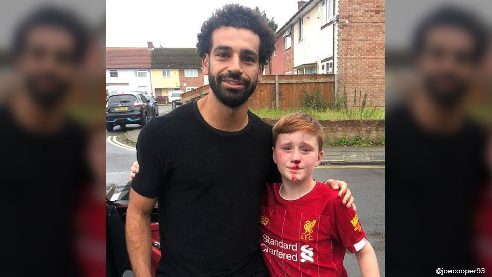 De jonge Livepool-fan kreeg uiteindelijk wat hij wilde, een foto met zijn held Mo Salah.