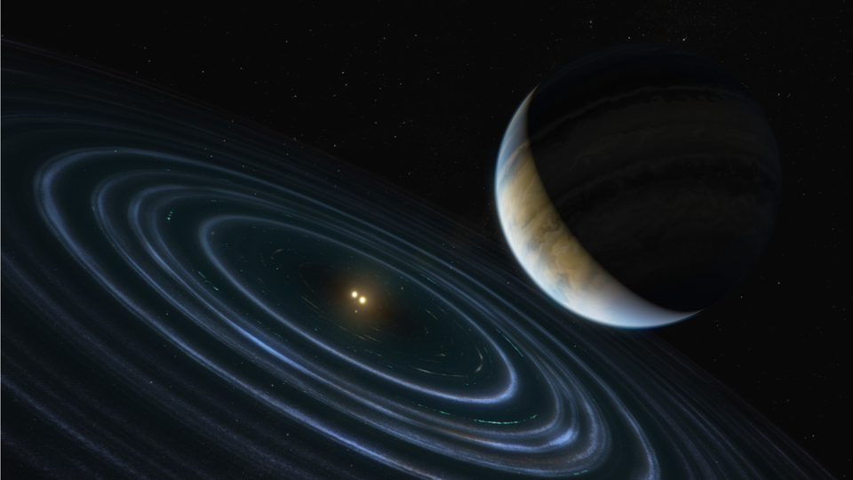 Voorstelling van de grote exoplaneet, HD 106906 b, in een baan ver van de dubbelster in het centrum van het zonnestelsel.