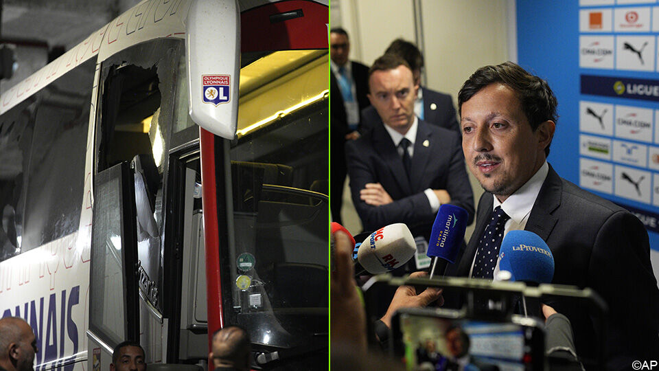 Links de zwaar gehavende Lyon-bus, rechts Marseille-voorzitter Pablo Longoria.