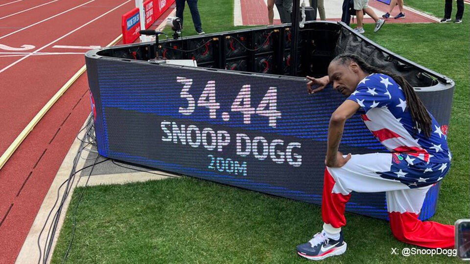 Snoop Dogg met zijn tijd op de 200 meter.