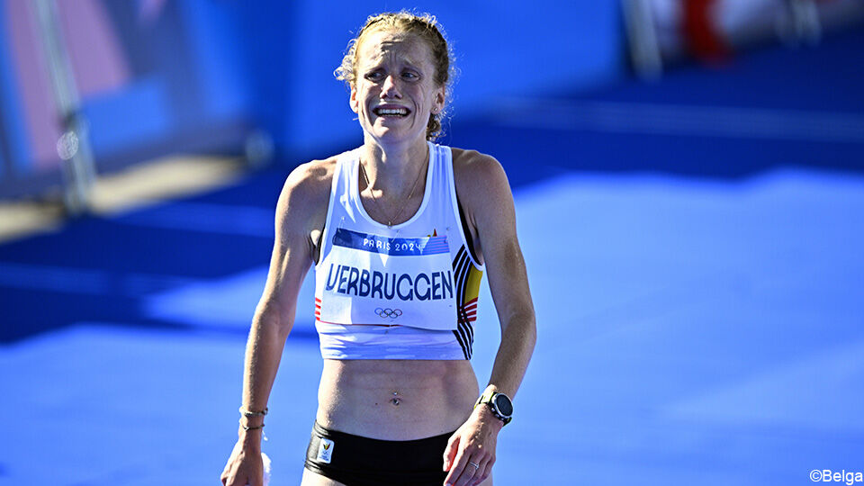 Hanne Verbruggen laat haar tranen de vrije loop na de finish.